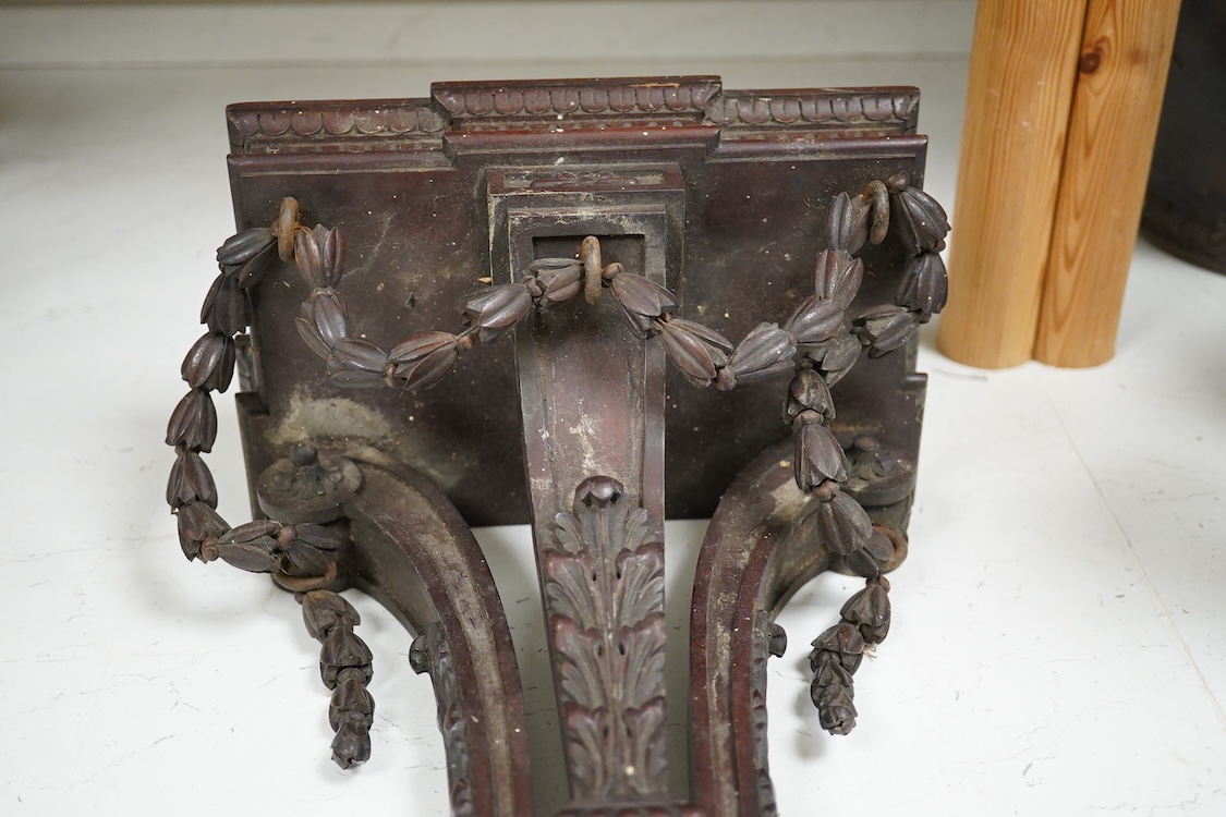 A late 19th century carved mahogany wall bracket, 35cm high